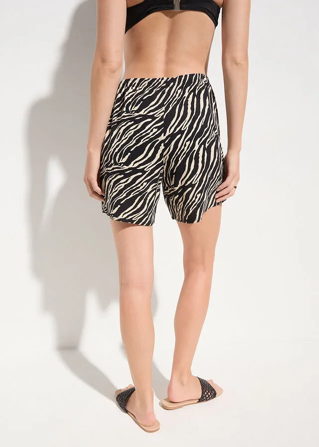 PANTALóN CORTO PLAYERO NEGROBEIGE CON ESTAMPADO DE CEBRA