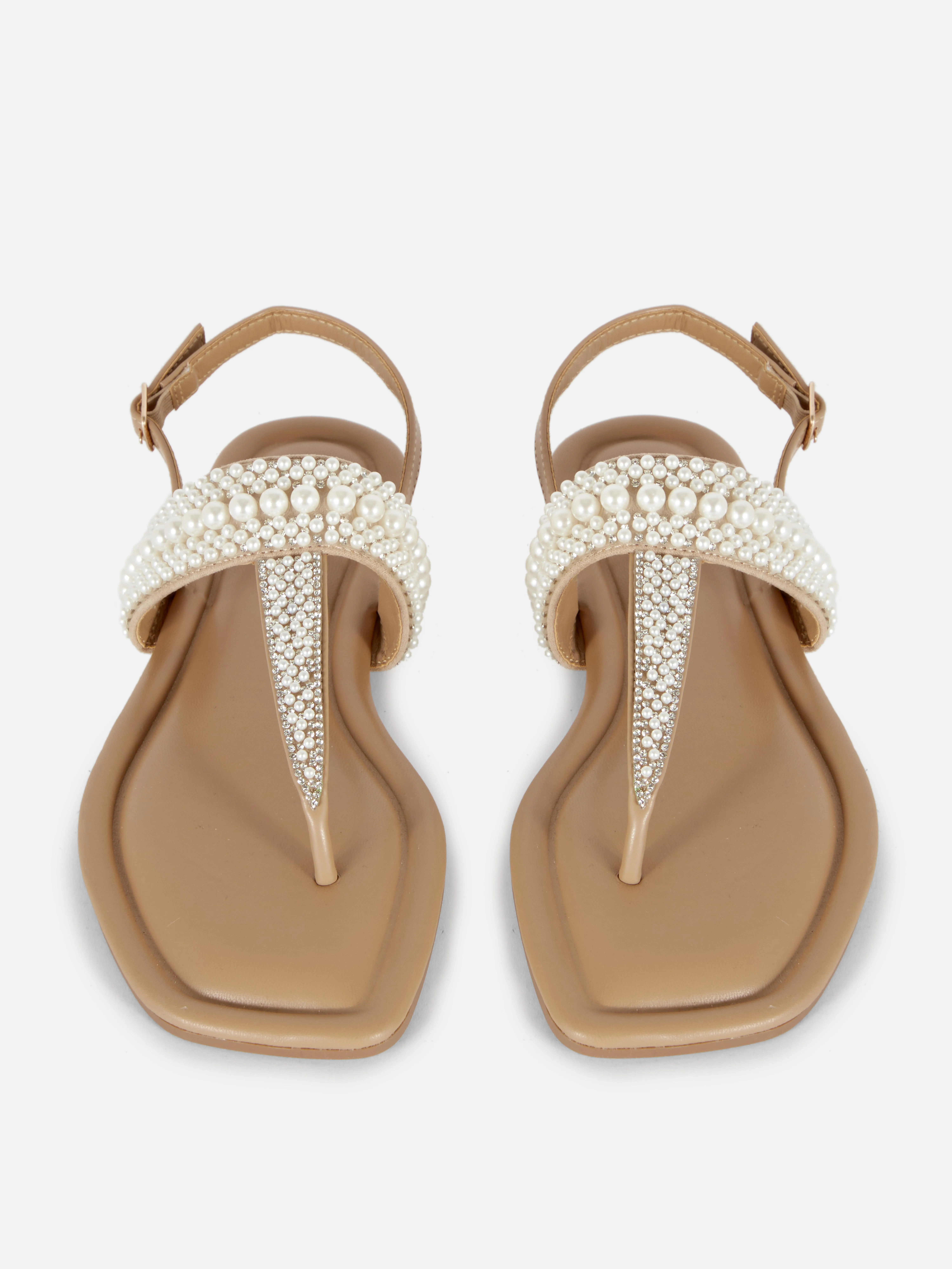 Sandalias de dedo con adornos