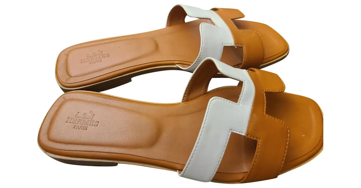 Sandalias Hermès Oran Blanco Bronce 