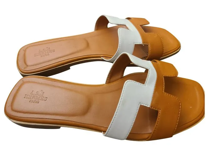Sandalias Hermès Oran Blanco Bronce 