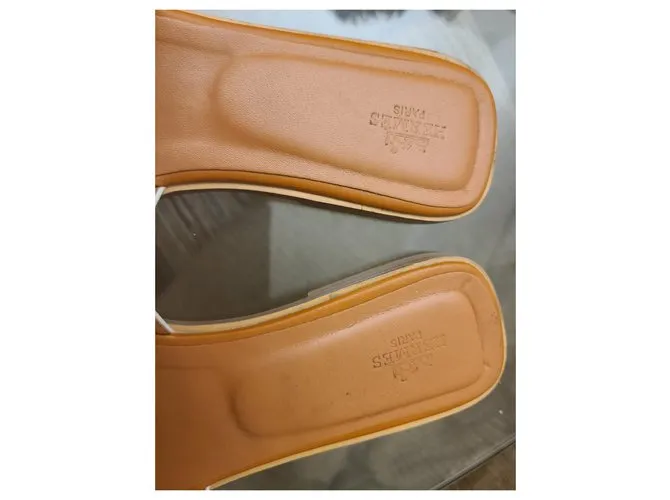 Sandalias Hermès Oran Blanco Bronce 